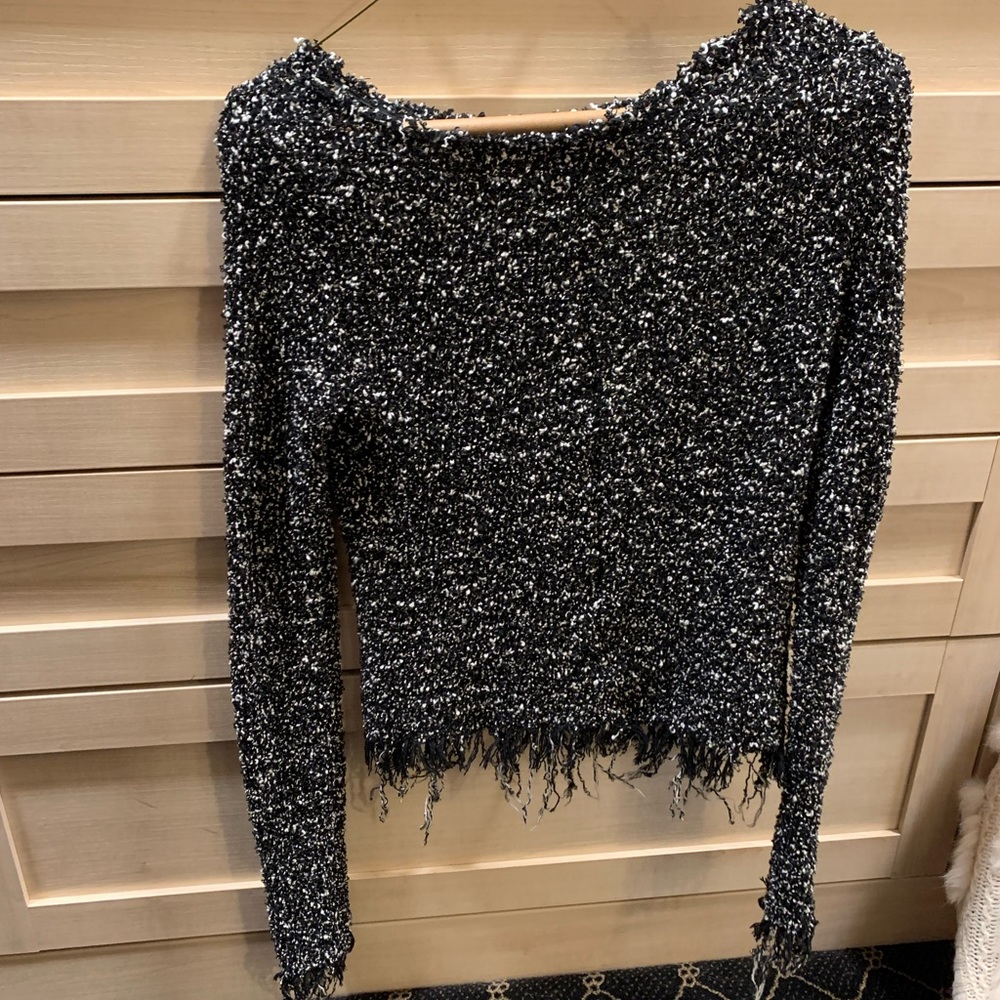 Speckled sweater, new condition.